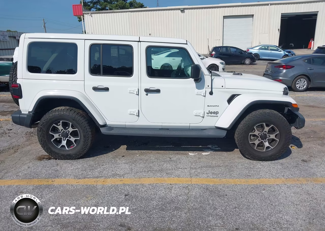 2019 Jeep Wrangler Unlimited Sahara 4X4 VIN:1C4HJXEG9KW612843 - 13