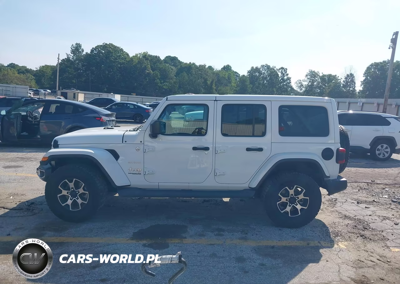 2019 Jeep Wrangler Unlimited Sahara 4X4 VIN:1C4HJXEG9KW612843 - 14
