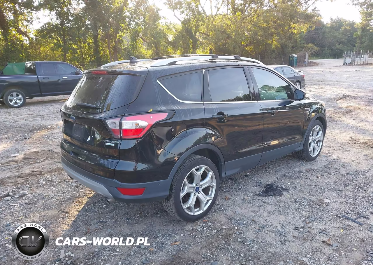 2018 Ford Escape Titanium VIN:1FMCU0J98JUB95141 - 4