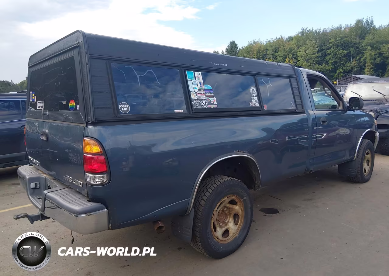 2005 Toyota Tundra Base V8 VIN:5TBKT42105S463623 - 4