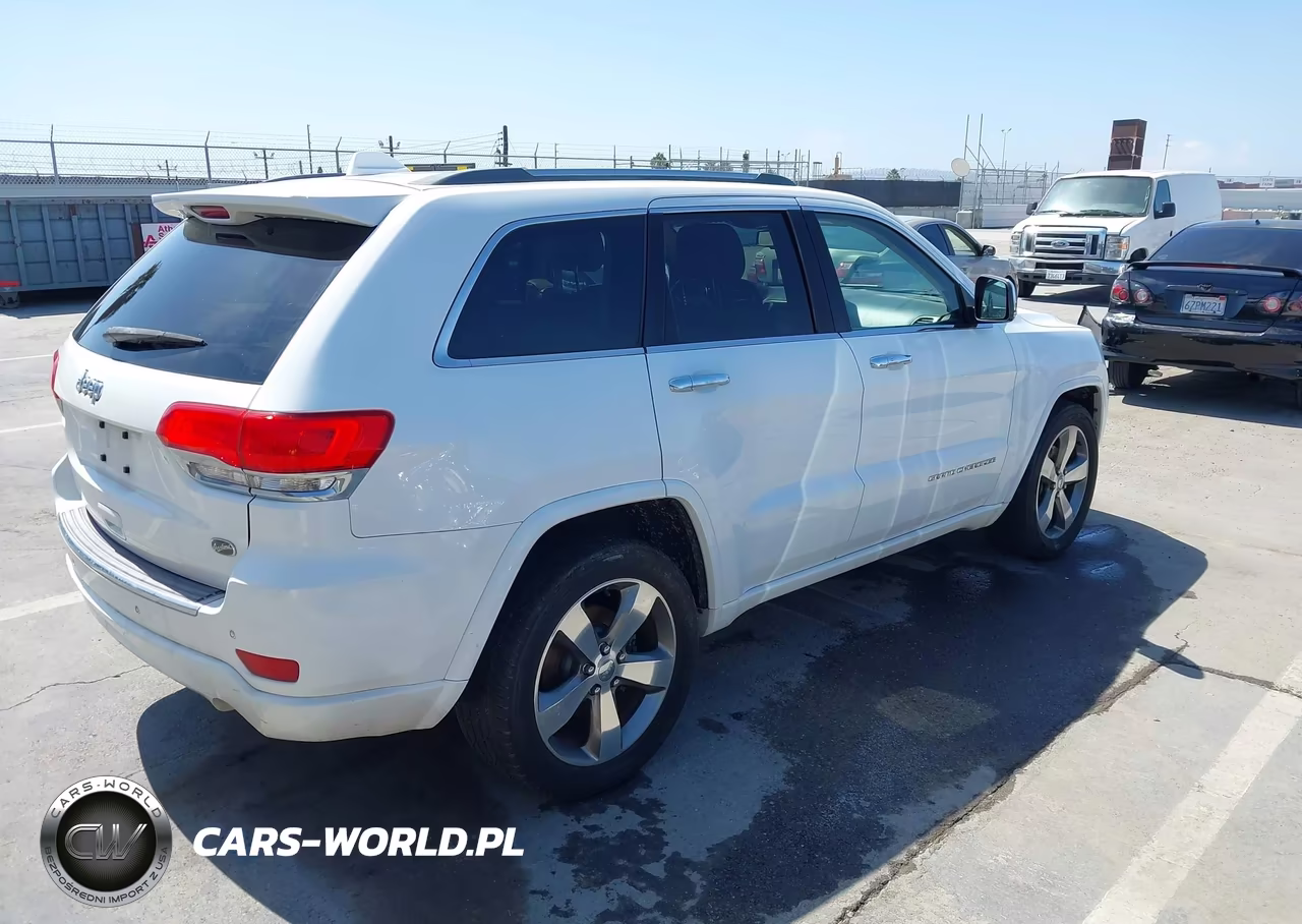2015 Jeep Grand Cherokee Overland VIN:1C4RJECGXFC906481 - 4