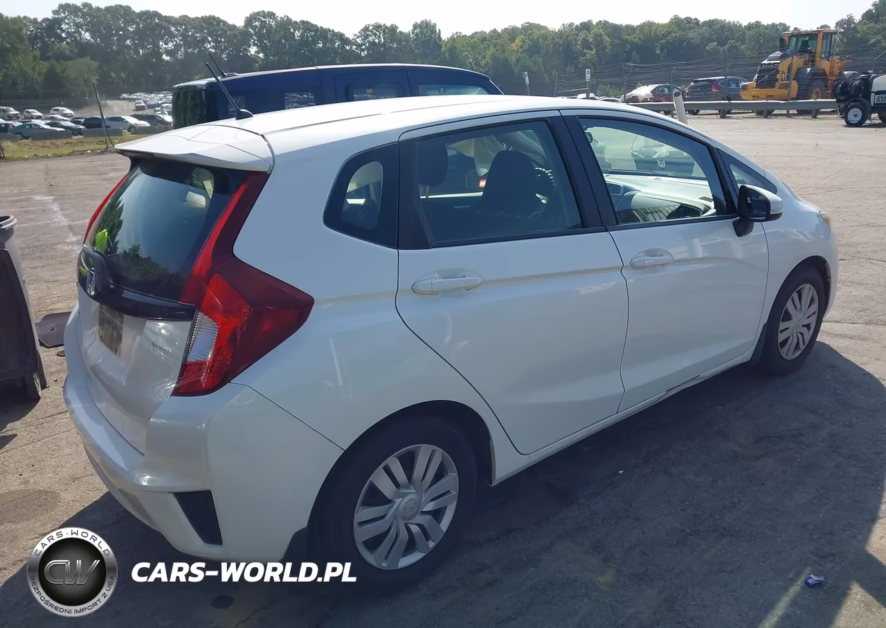 2016 Honda Fit Lx VIN:JHMGK5H54GX009869 - 4