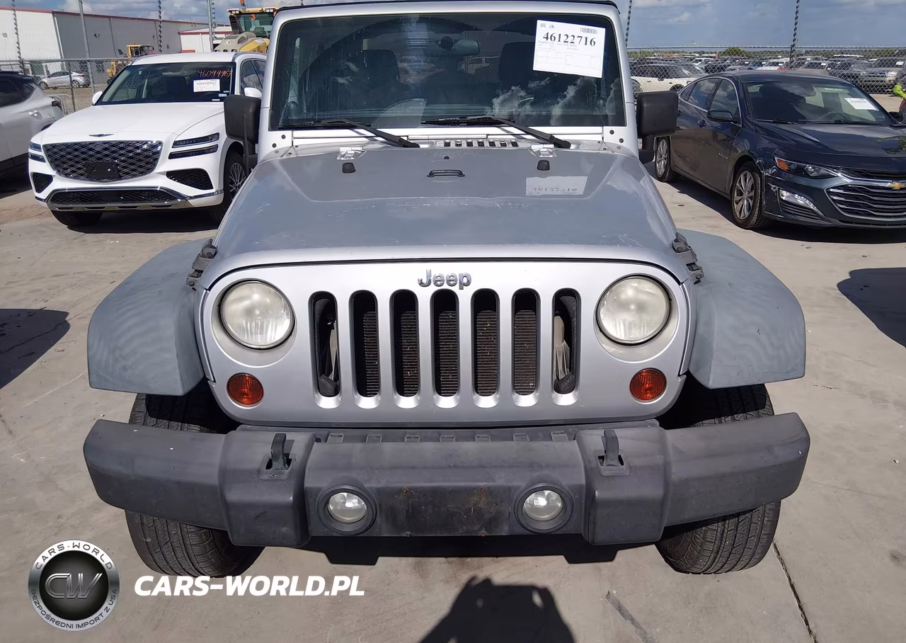 2011 Jeep Wrangler Sport VIN:1J4AA2D15BL528810 - 12