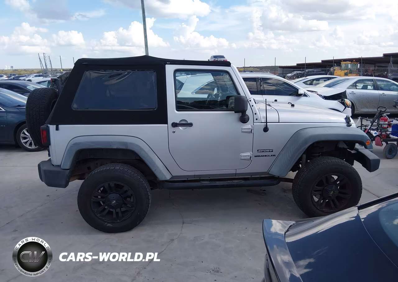 2011 Jeep Wrangler Sport VIN:1J4AA2D15BL528810 - 13
