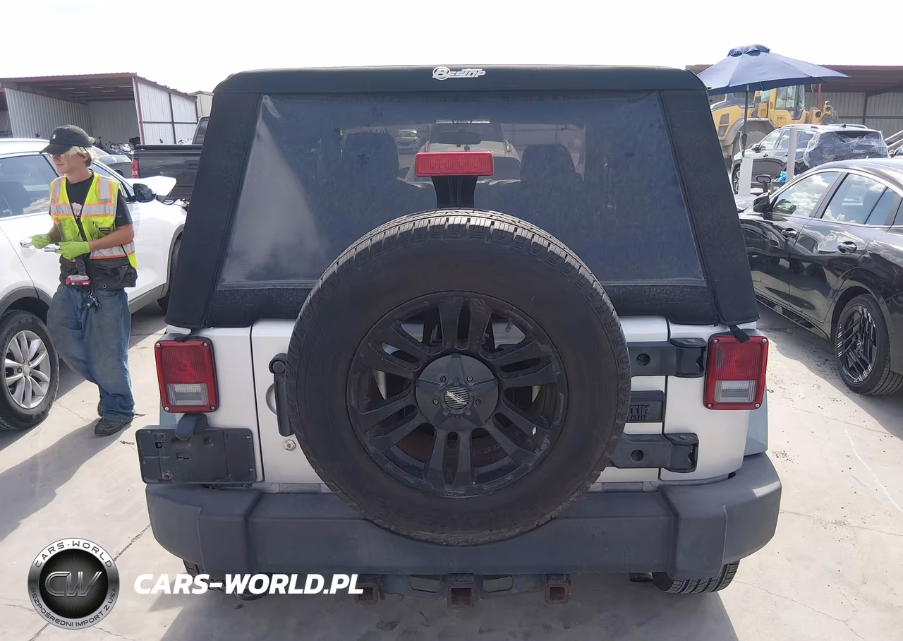 2011 Jeep Wrangler Sport VIN:1J4AA2D15BL528810 - 16
