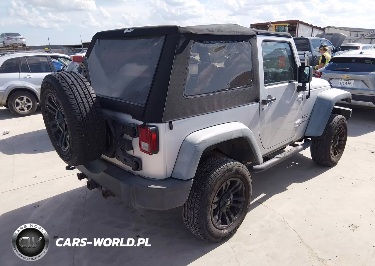 2011 Jeep Wrangler Sport VIN:1J4AA2D15BL528810 - 4