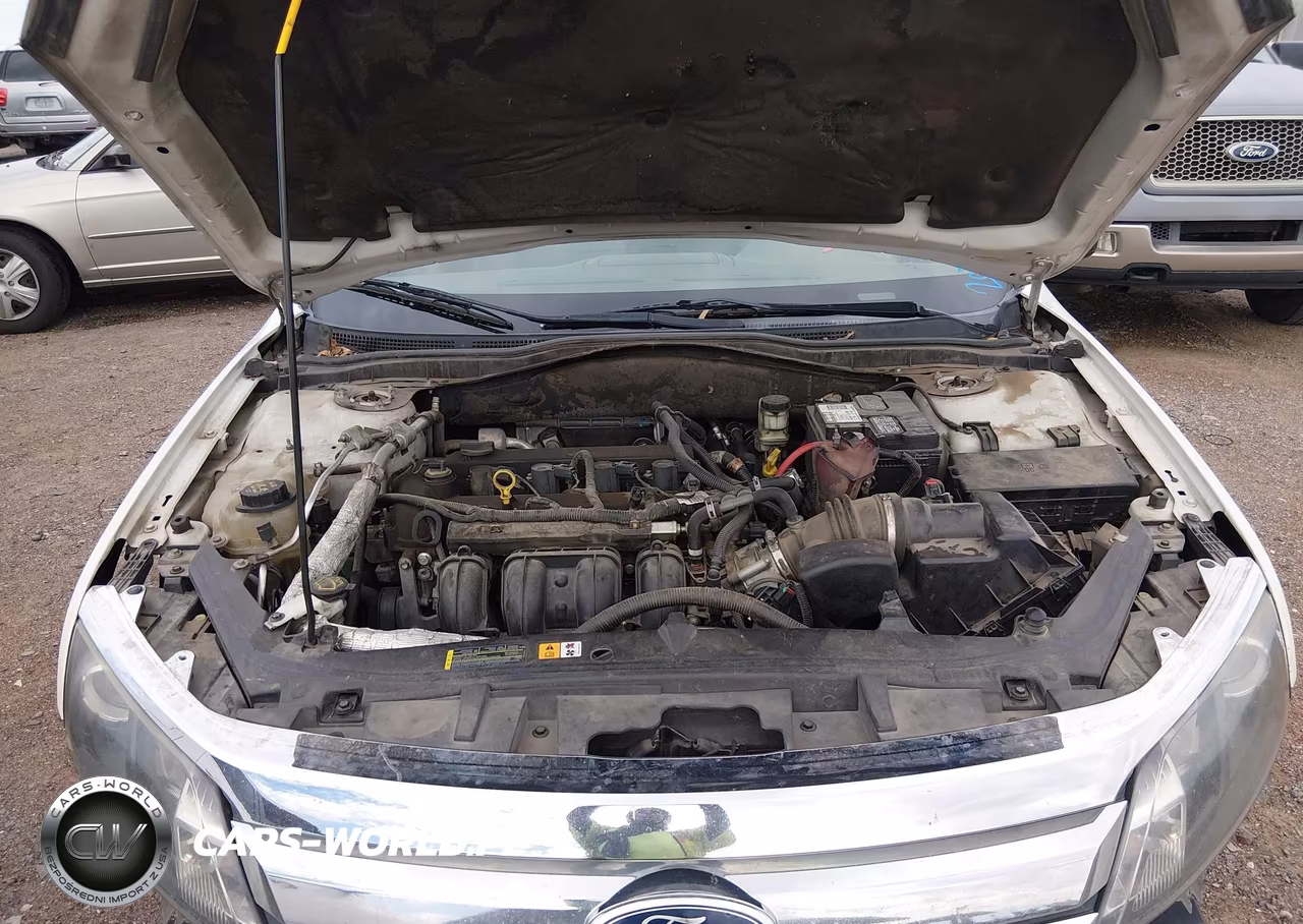 2012 Ford Fusion S VIN:3FAHP0GA9CR377921 - 10