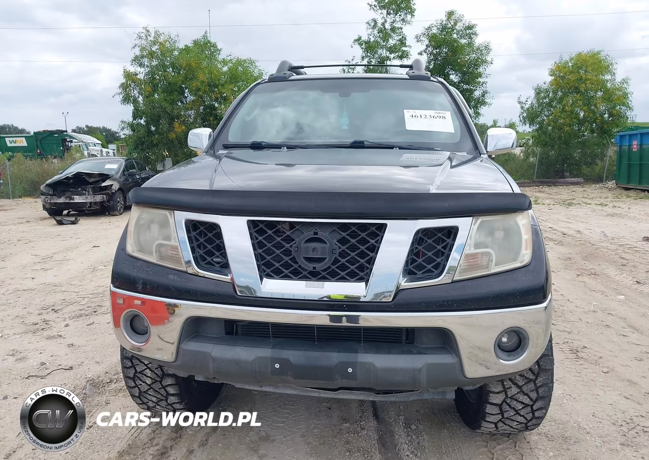 2009 Nissan Frontier Le VIN:1N6AD07U09C418696 - 13