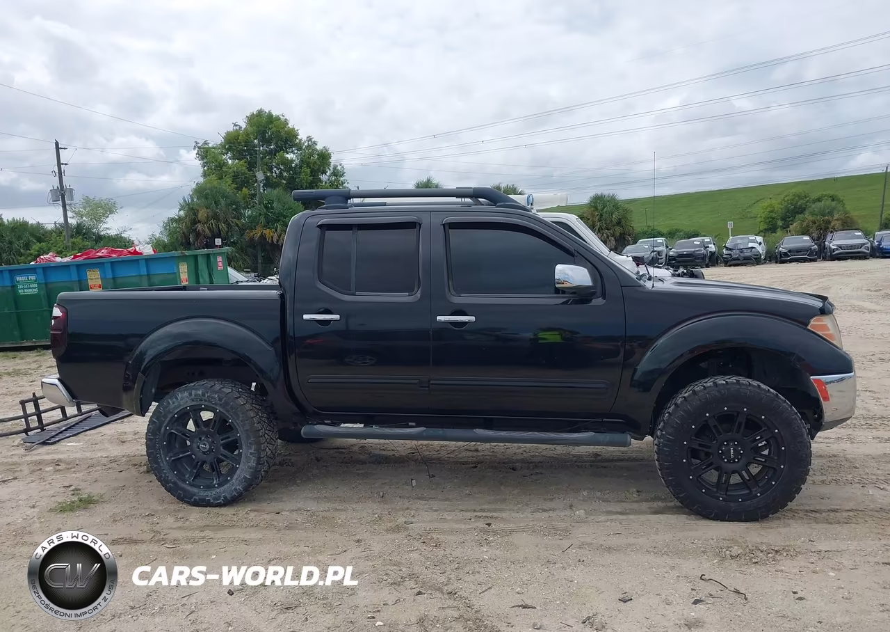 2009 Nissan Frontier Le VIN:1N6AD07U09C418696 - 14