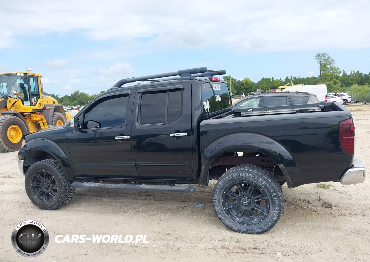 2009 Nissan Frontier Le VIN:1N6AD07U09C418696 - 15