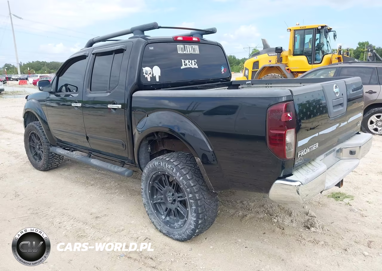 2009 Nissan Frontier Le VIN:1N6AD07U09C418696 - 3