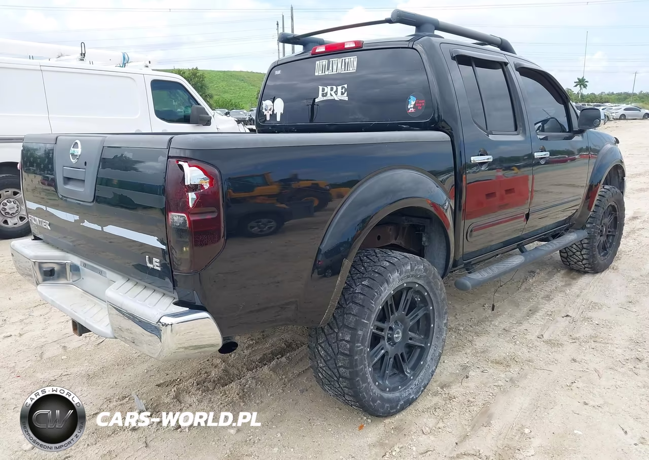2009 Nissan Frontier Le VIN:1N6AD07U09C418696 - 4