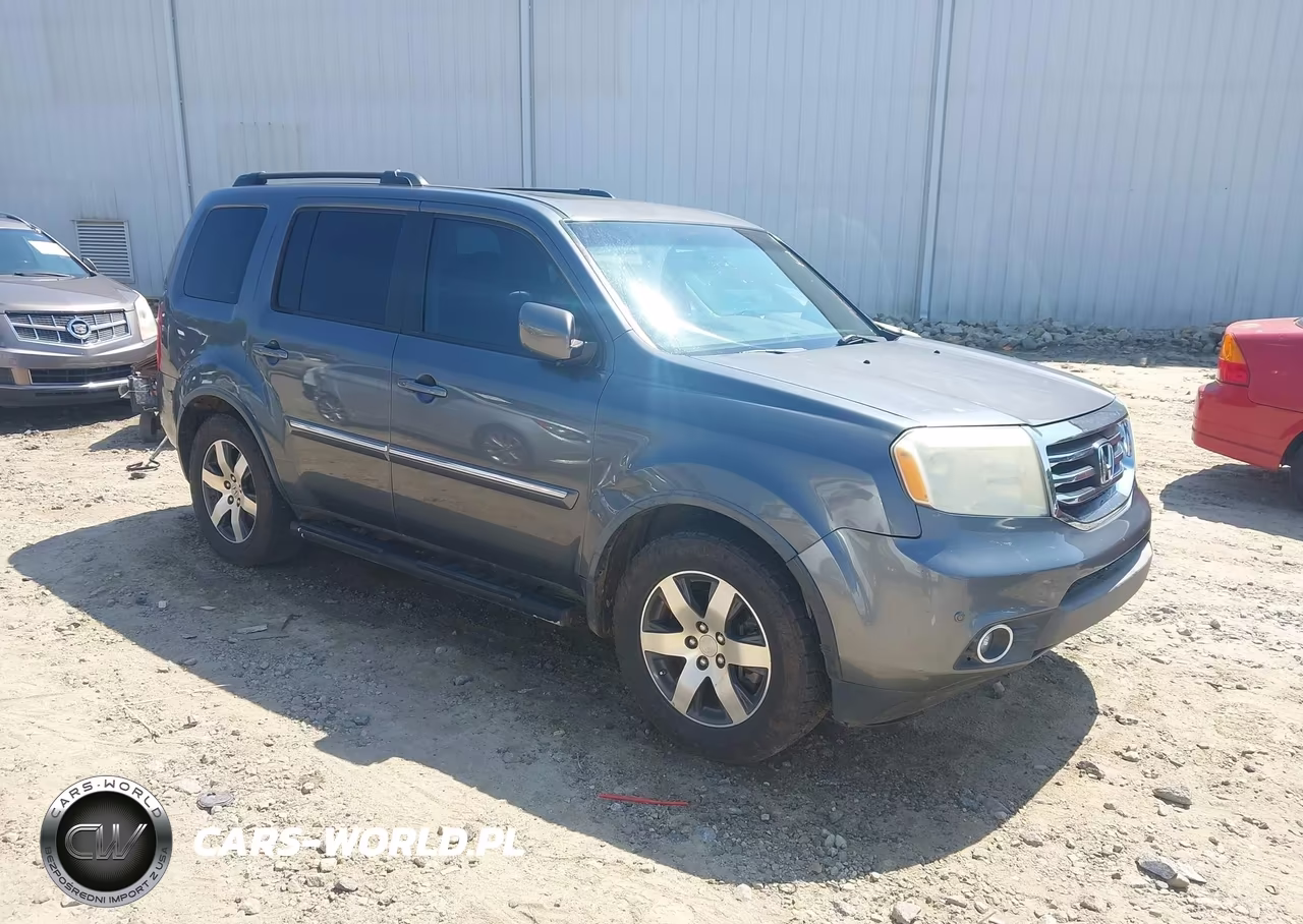 2012 Honda Pilot Touring VIN:5FNYF4H95CB060308 - 1