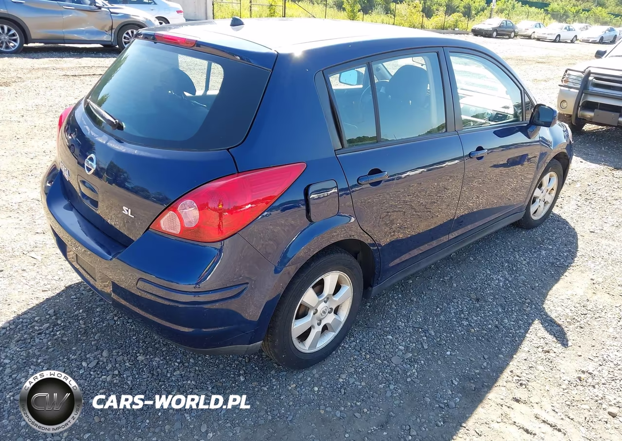 2009 Nissan Versa 1.8Sl VIN:3N1BC13EX9L382828 - 4