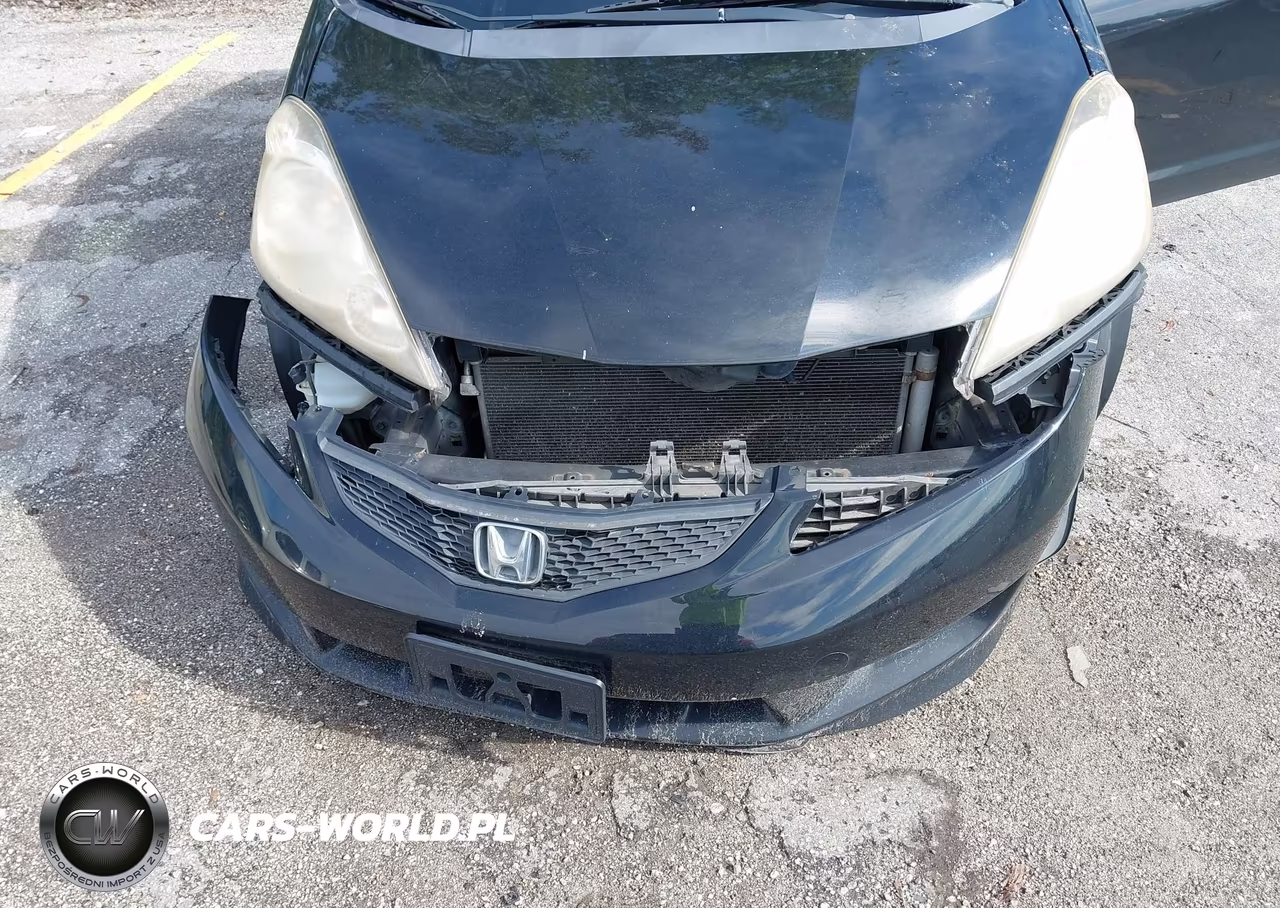 2011 Honda Fit Sport VIN:JHMGE8H52BC026548 - 6