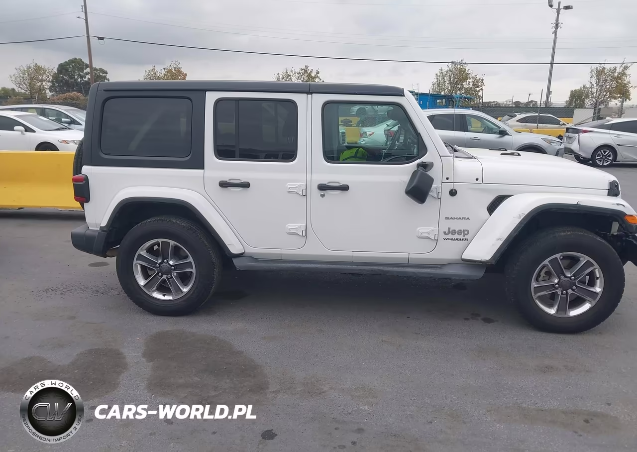 2019 Jeep Wrangler Unlimited Sahara 4X4 VIN:1C4HJXEN6KW614676 - 13