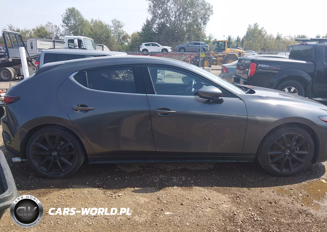 2021 Mazda Mazda3 Premium VIN:JM1BPAML3M1302963 - 14