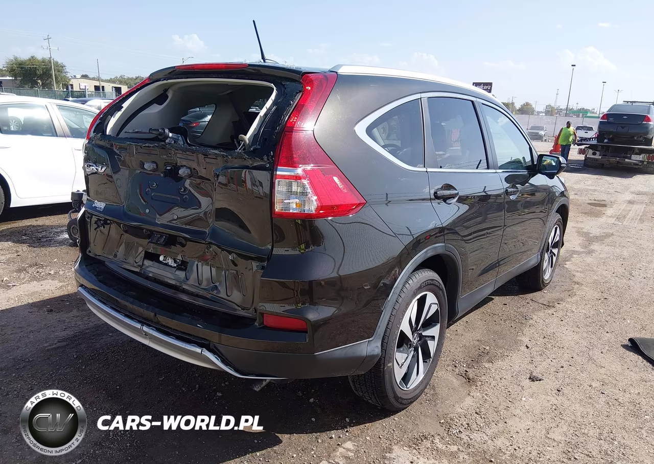 2015 Honda Cr-V Touring VIN:5J6RM3H95FL025932 - 4
