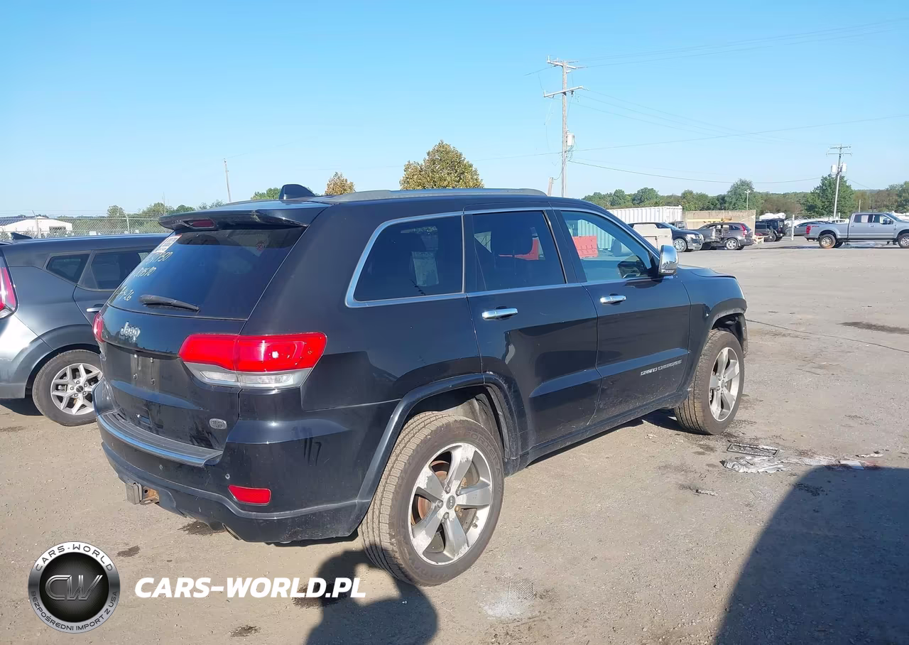 2014 Jeep Grand Cherokee Overland VIN:1C4RJFCG8EC209590 - 4