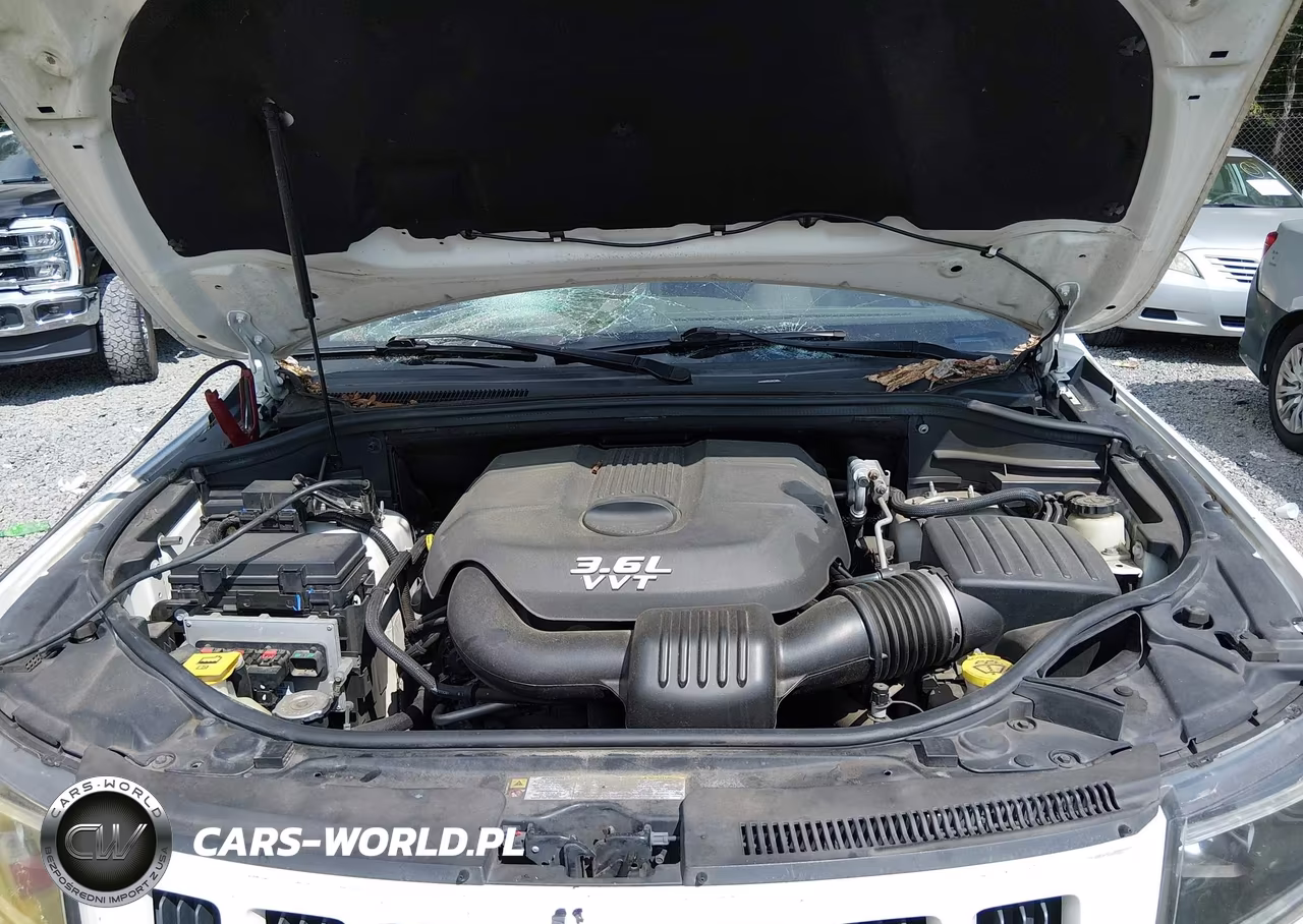 2012 Jeep Grand Cherokee Laredo VIN:1C4RJEAG4CC215607 - 10