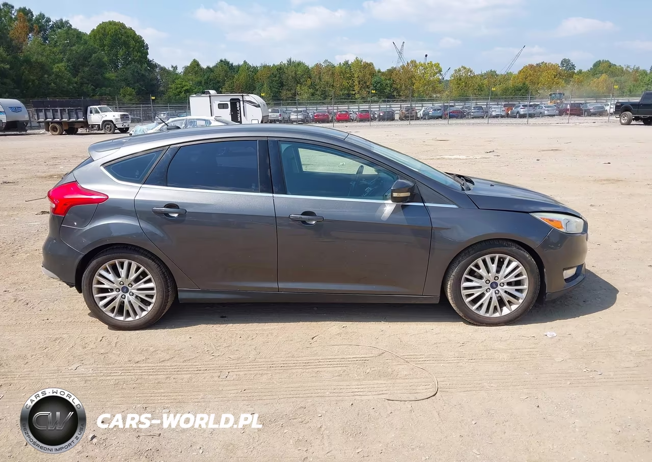 2016 Ford Focus Titanium VIN:1FADP3N23GL235449 - 14