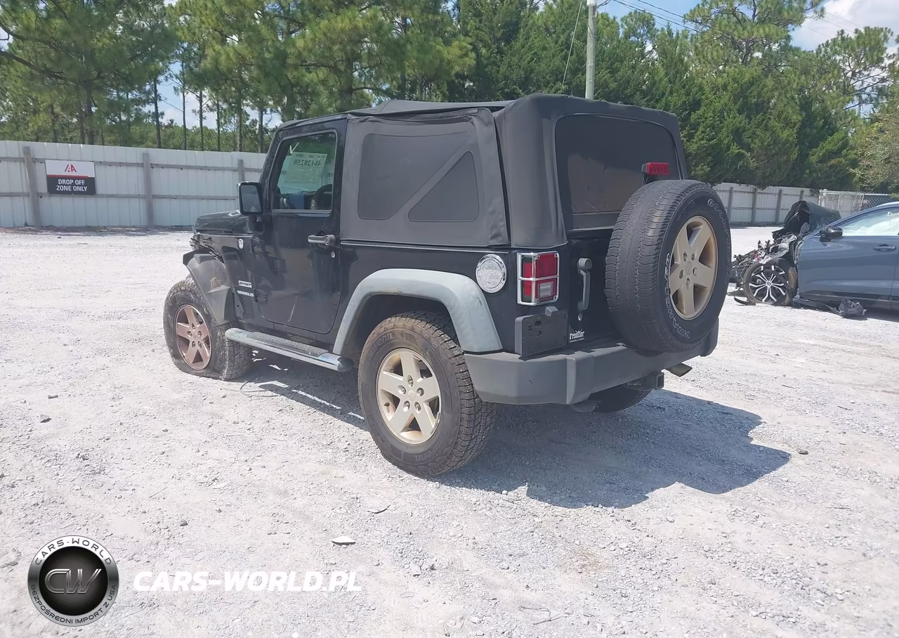 2011 Jeep Wrangler Sport VIN:1J4AA2D18BL630991 - 3