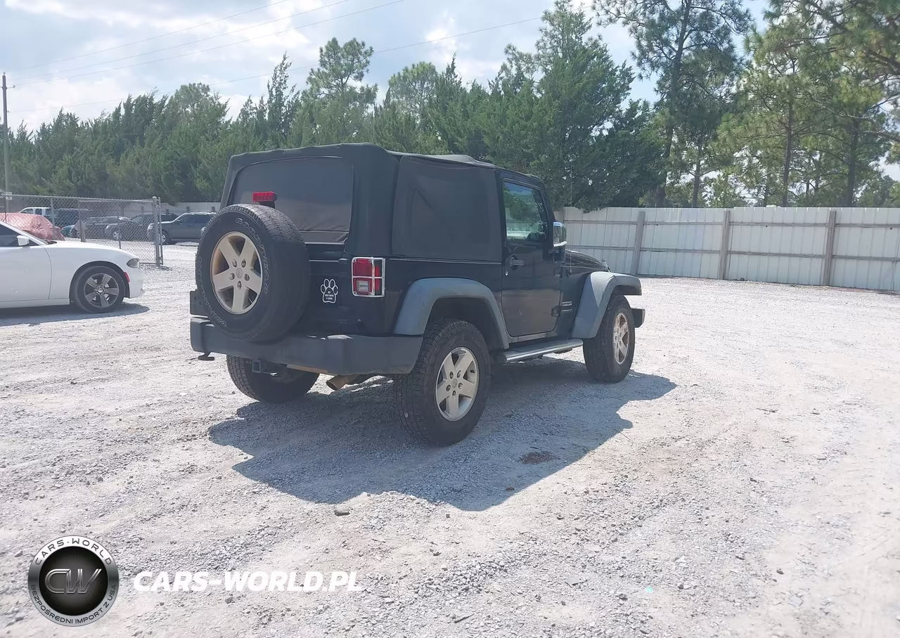 2011 Jeep Wrangler Sport VIN:1J4AA2D18BL630991 - 4