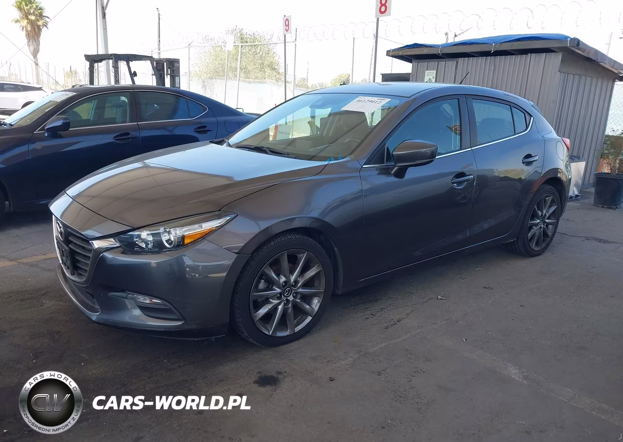 2018 Mazda Mazda3 Touring VIN:3MZBN1L33JM210500 - 2
