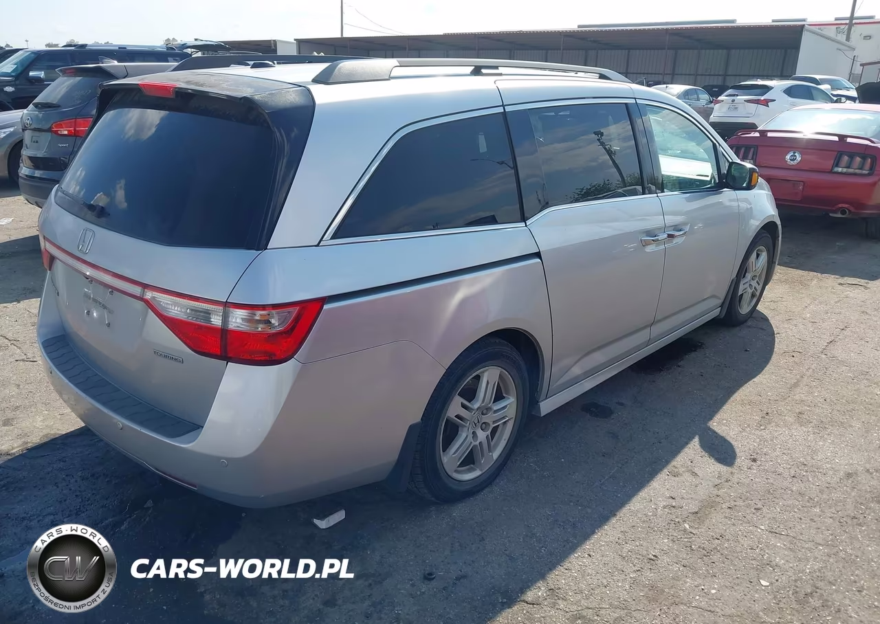 2011 Honda Odyssey Touring-Touring Elite VIN:5FNRL5H95BB052839 - 4