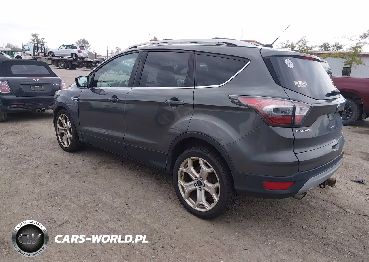 2017 Ford Escape Titanium VIN:1FMCU0J97HUB30016 - 3