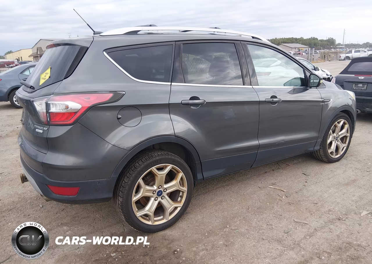 2017 Ford Escape Titanium VIN:1FMCU0J97HUB30016 - 4