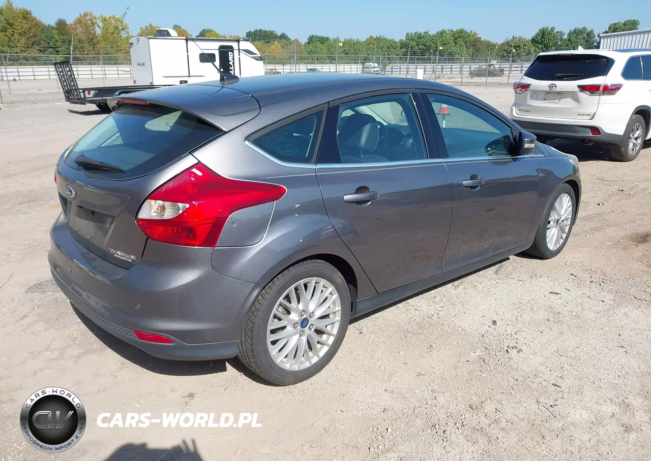 2014 Ford Focus Titanium VIN:1FADP3N27EL410749 - 4