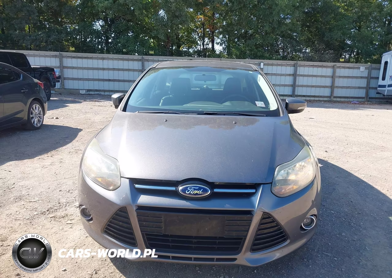 2014 Ford Focus Titanium VIN:1FADP3N27EL410749 - 6