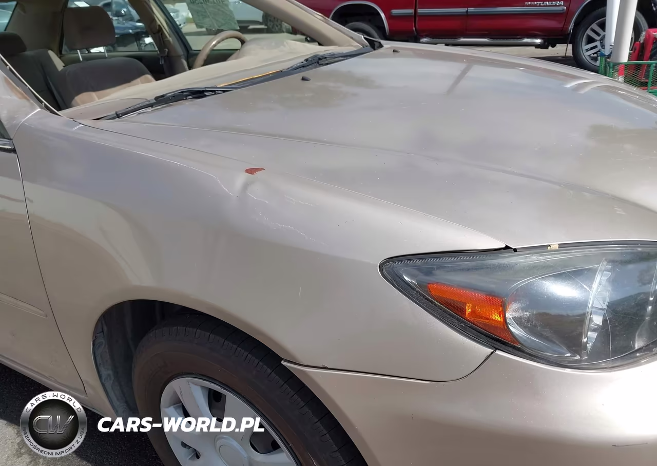 2002 Toyota Camry Le VIN:JTDBE32K920084042 - 12