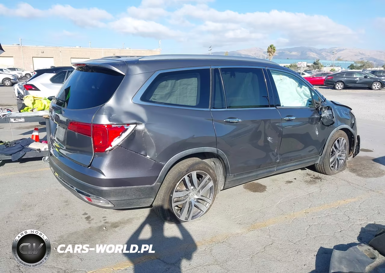 2016 Honda Pilot Touring VIN:5FNYF5H92GB047852 - 4