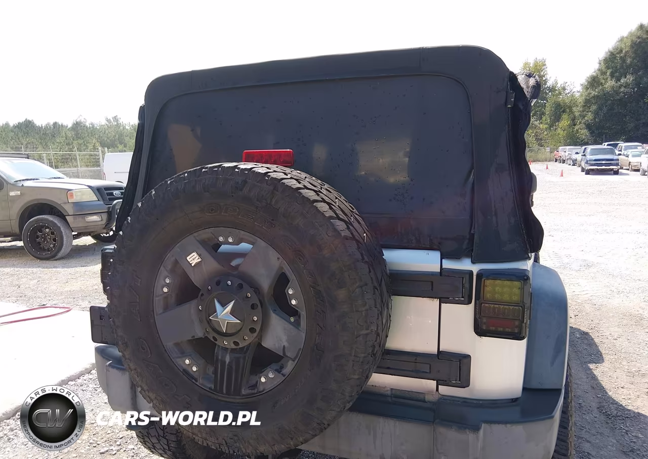2012 Jeep Wrangler Unlimited Sport VIN:1C4BJWDG1CL284595 - 13