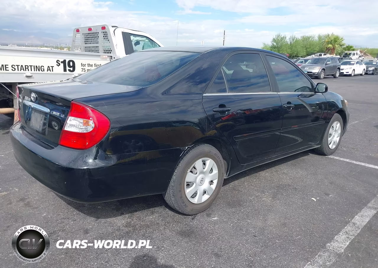 2004 Toyota Camry Le VIN:JTDBE32K940268206 - 4