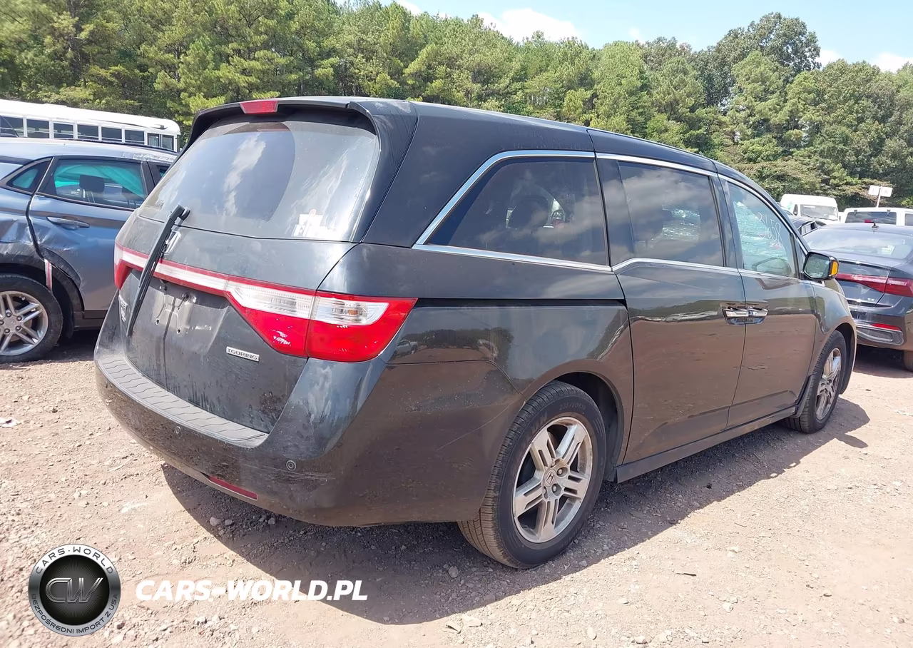 2011 Honda Odyssey Touring-Touring Elite VIN:5FNRL5H97BB046413 - 4