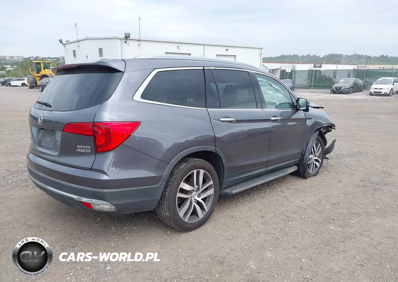 2017 Honda Pilot Touring VIN:5FNYF6H90HB105058 - 4