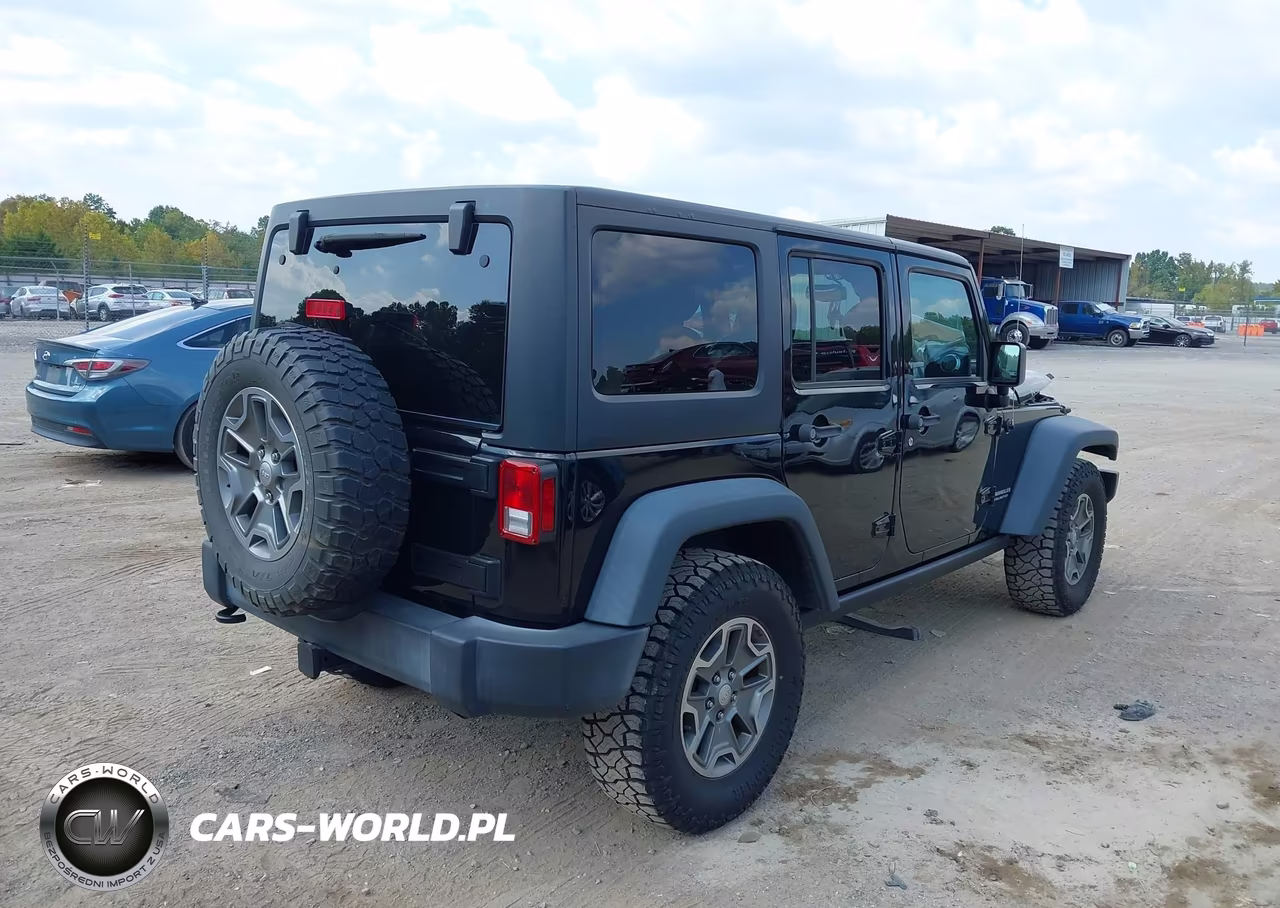 2017 Jeep Wrangler Unlimited Rubicon 4X4 VIN:1C4BJWFG4HL523433 - 4
