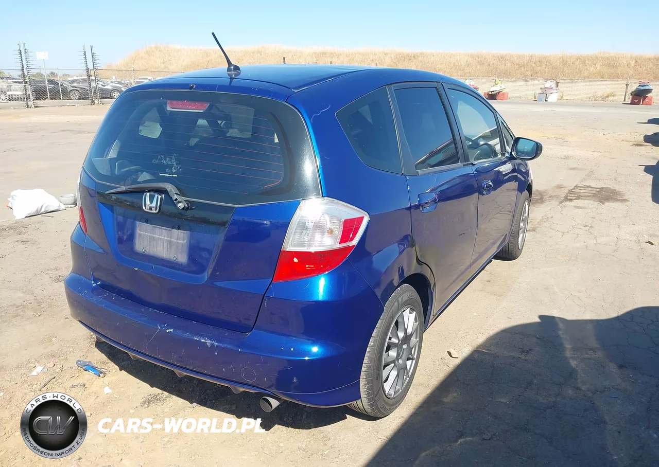 2009 Honda Fit VIN:JHMGE88259S044886 - 4