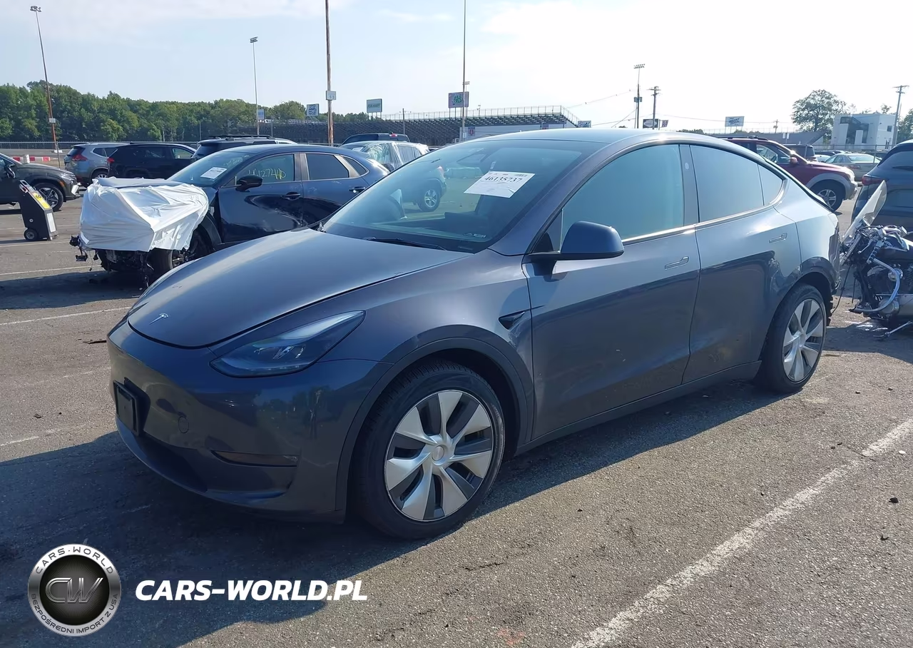 2023 Tesla Model Y Awd-Long Range Dual Motor All-Wheel Drive VIN:7SAYGAEE6PF858676 - 2