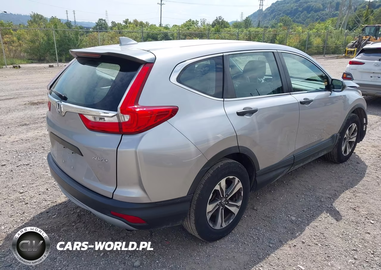 2019 Honda Cr-V Lx VIN:2HKRW6H36KH215444 - 4