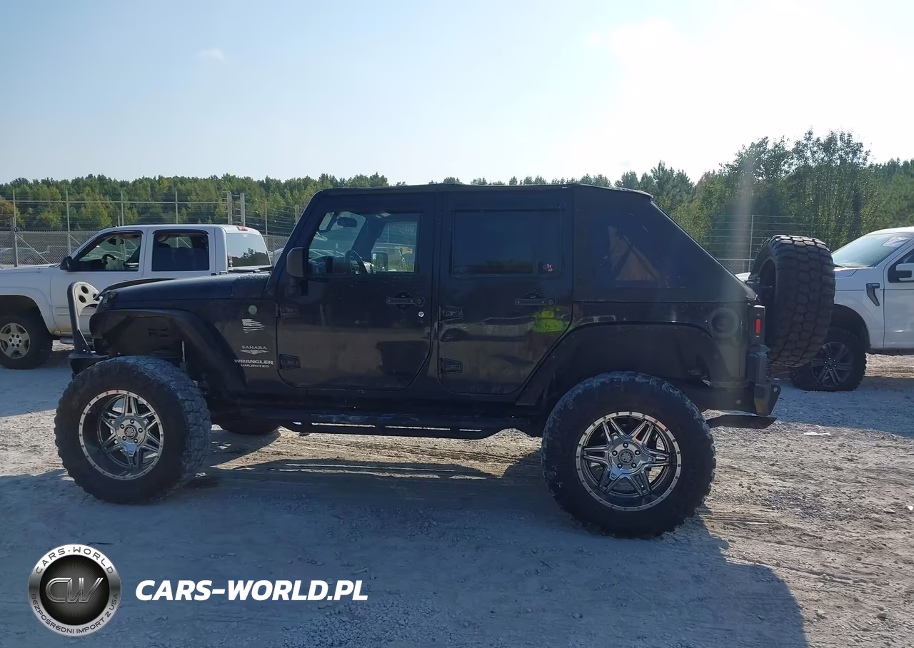 2008 Jeep Wrangler Unlimited Sahara VIN:1J4GA59198L520917 - 14