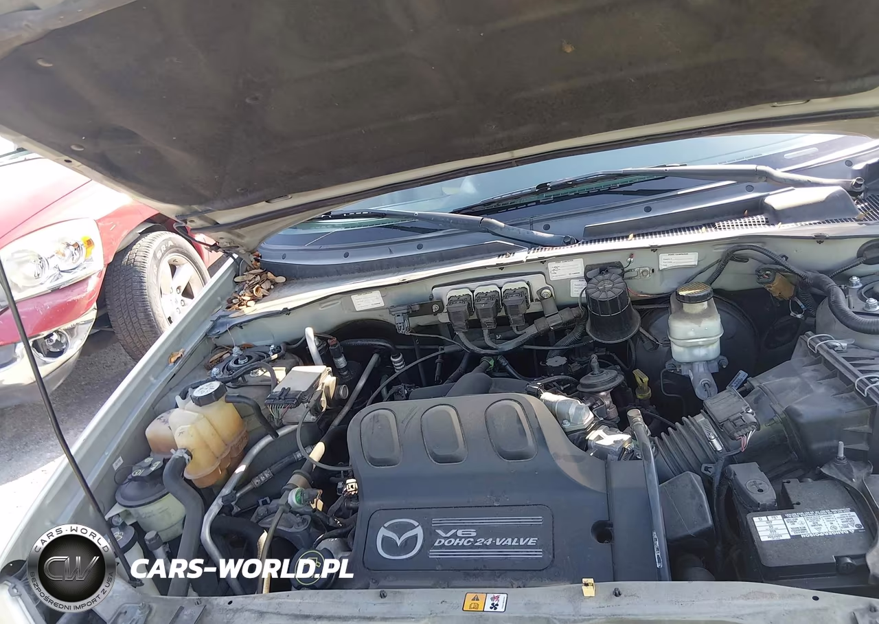 2005 Mazda Tribute S VIN:4F2CZ06115KM04908 - 10