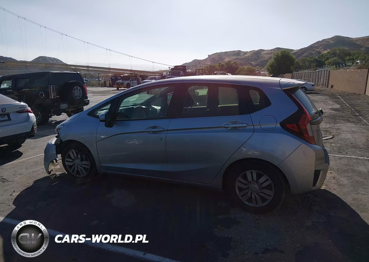 2015 Honda Fit Lx VIN:3HGGK5H5XFM748736 - 14