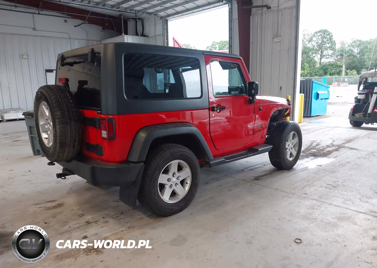 2015 Jeep Wrangler Sport VIN:1C4AJWAG6FL690909 - 4
