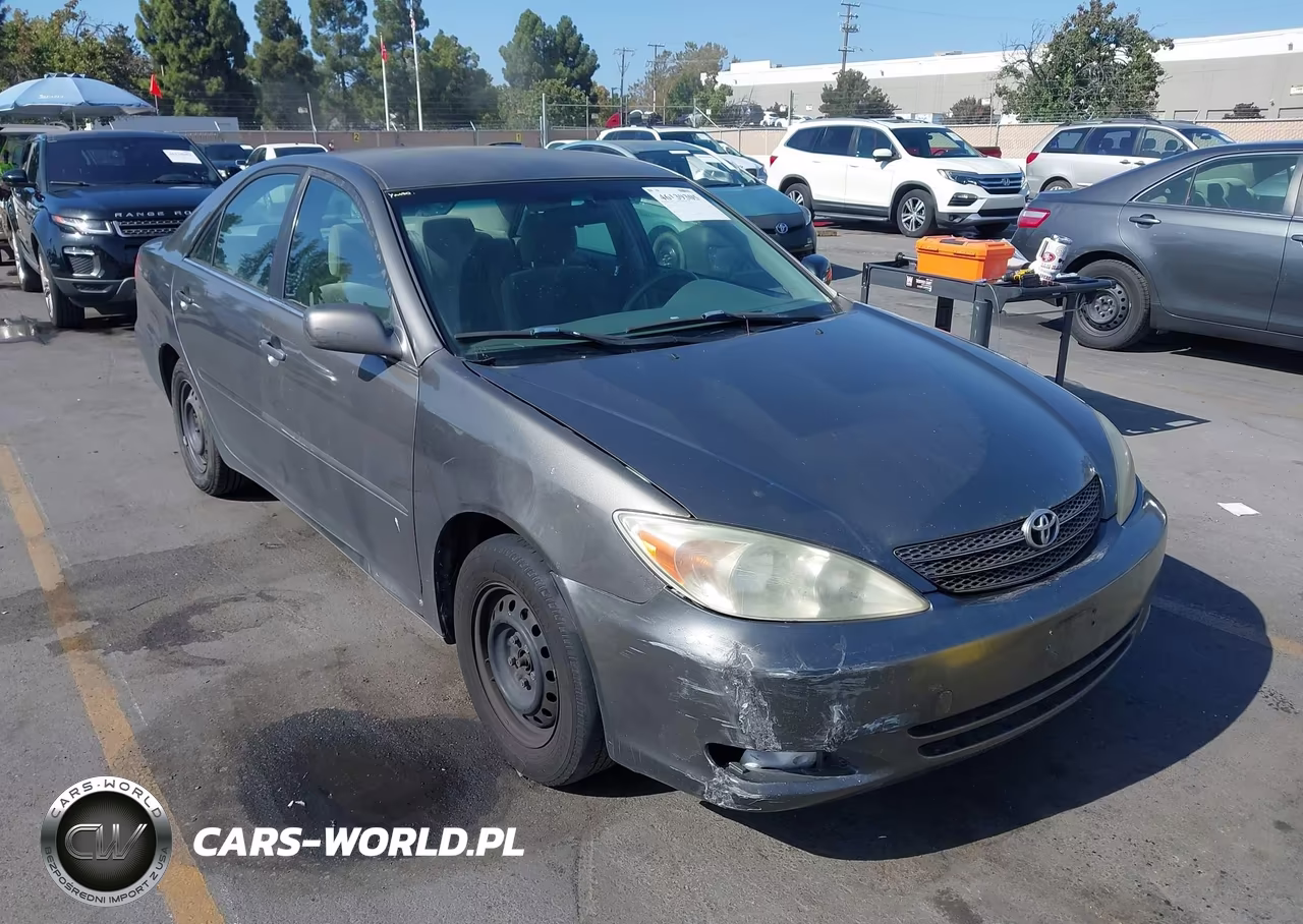 2002 Toyota Camry Le VIN:JTDBE30K920130990 - 6