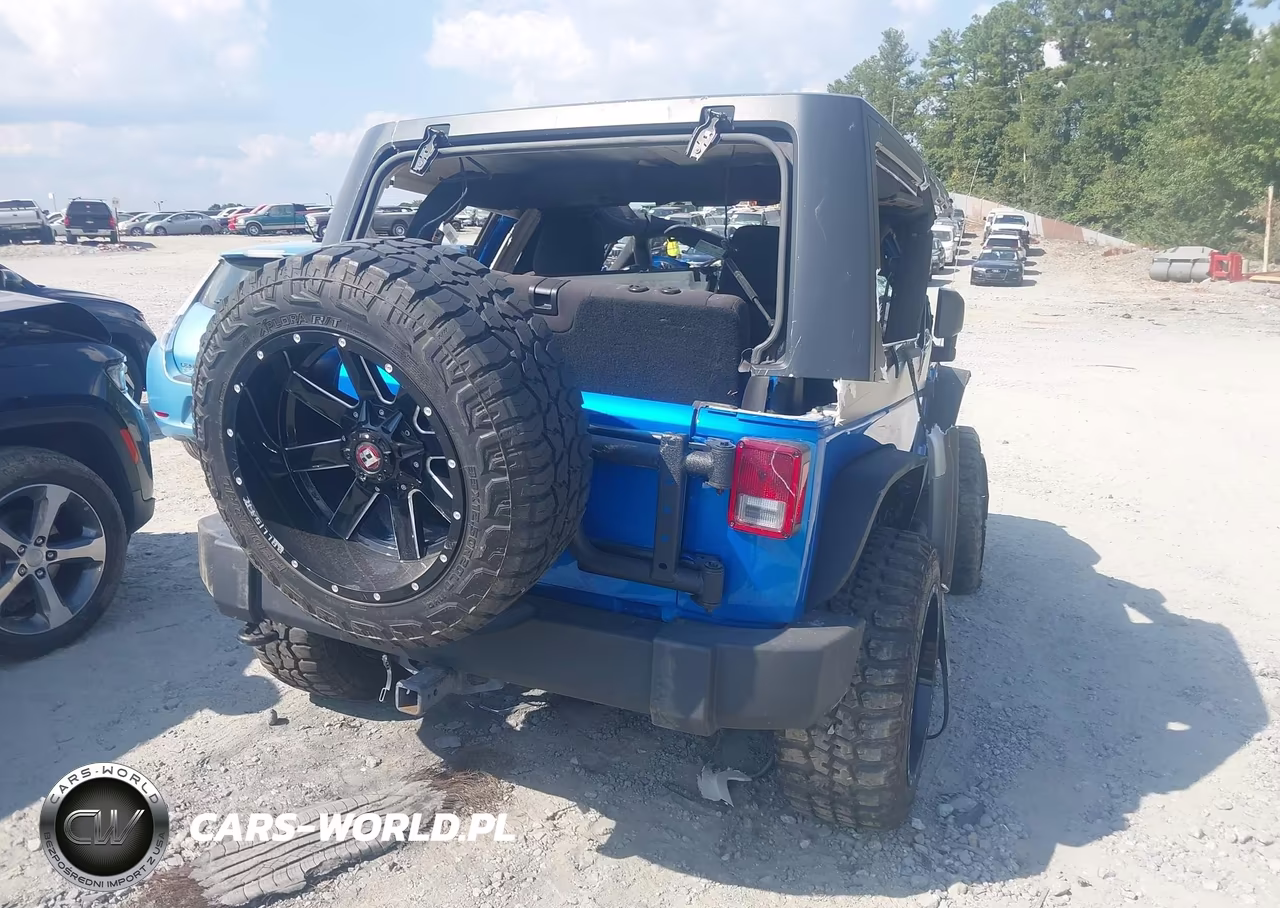 2015 Jeep Wrangler Sport VIN:1C4AJWAG8FL676025 - 4