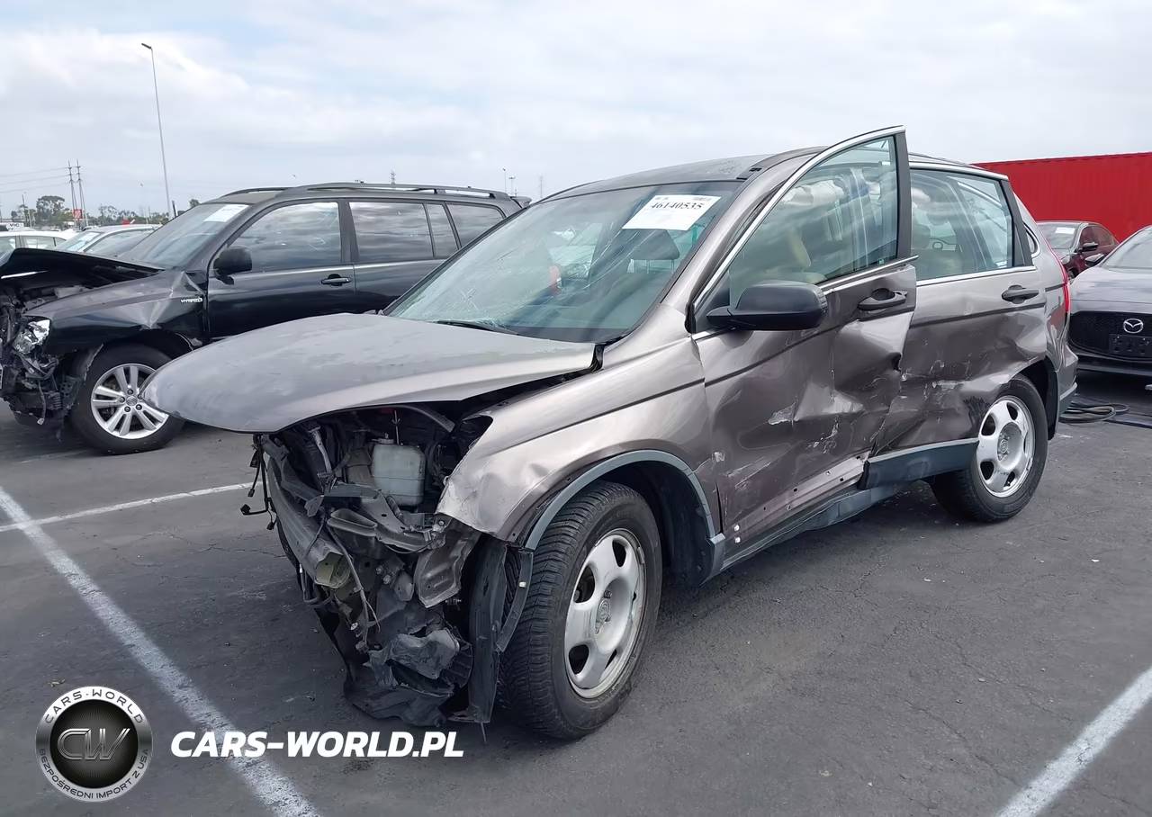 2011 Honda Cr-V Lx VIN:5J6RE3H36BL040037 - 2
